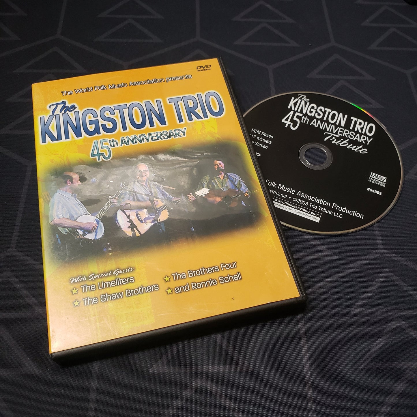 Image shows the case & disc for the concert film The Kingston Trio: 45th Anniversary on DVD