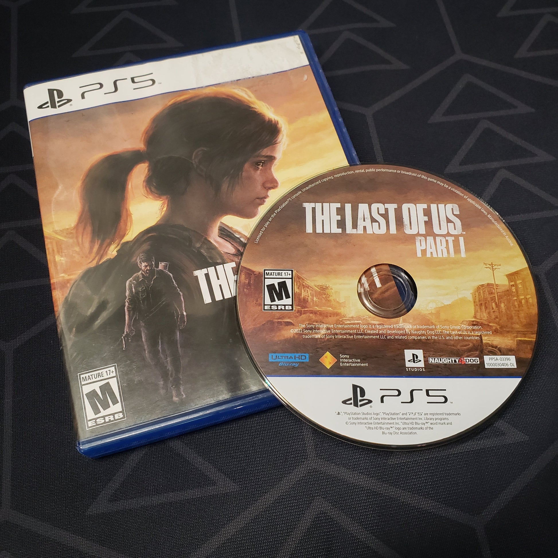 Image shows the case & disc for the video game The Last of Us: Part I for Playstation 5