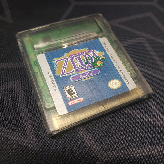 Image shows the front of the cartridge for the video game The Legend of Zelda: Oracle of Ages for Nintendo Game Boy Color