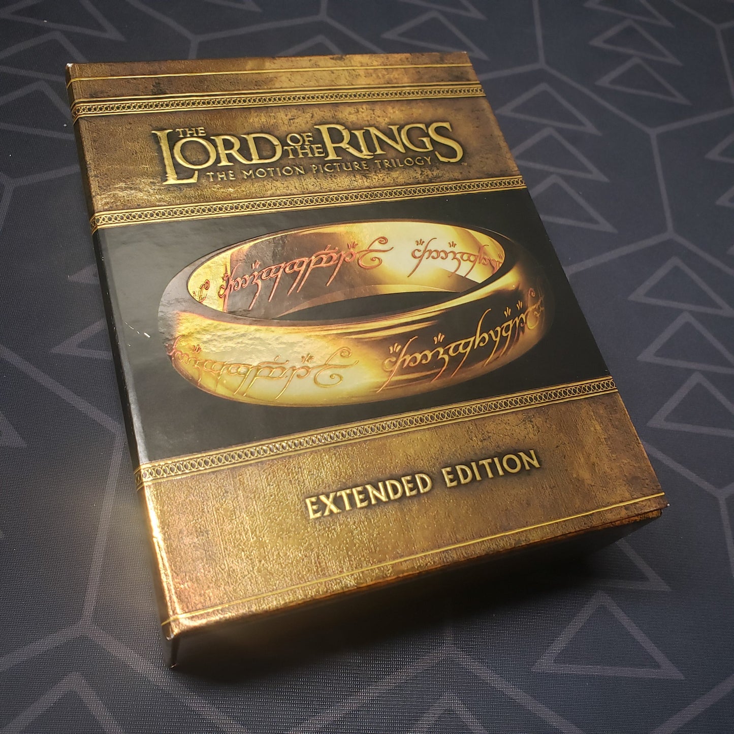 Image shows the front of the case for the movie set of The Lord of the Rings: Extended Edition Trilogy on Blu-Ray