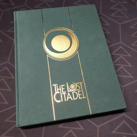 Image shows the front cover of the Deluxe Limited Edition core rulebook for the roleplaying game The Lost Citadel