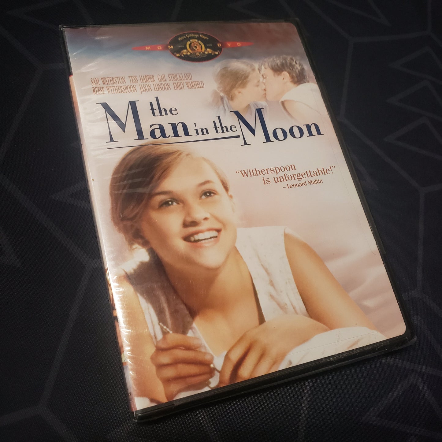 Image shows the front of the case for the movie The Man in the Moon on DVD