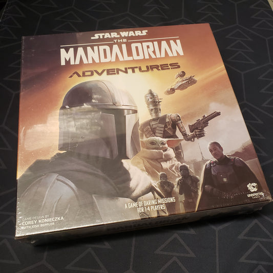 Image shows the front cover of the box for the The Mandalorian Adventures board game