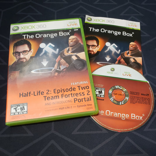 Image shows the case, manual and disc for the video game The Orange Box for Xbox 360