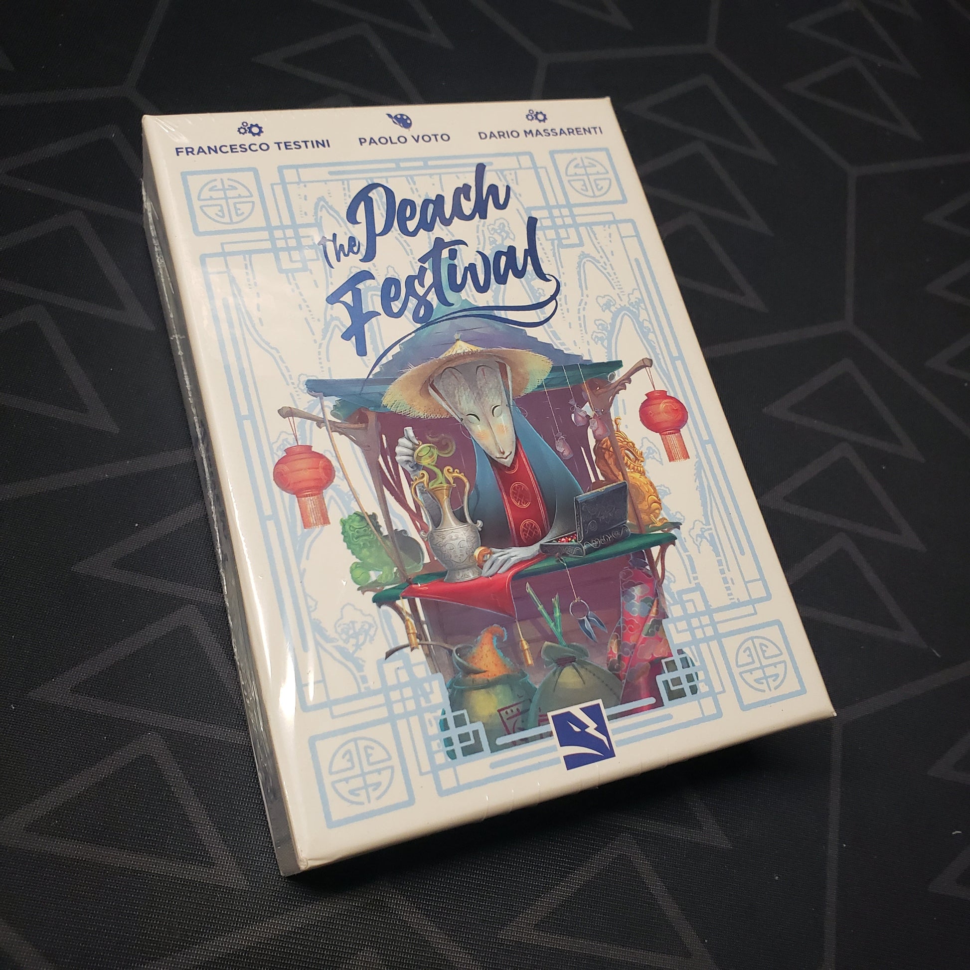 Image shows the front cover of the box for the Peach Festival board game