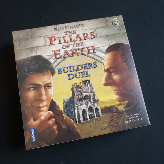 Image shows the front cover of the box of the Pillars of the Earth: Builders Duel card game