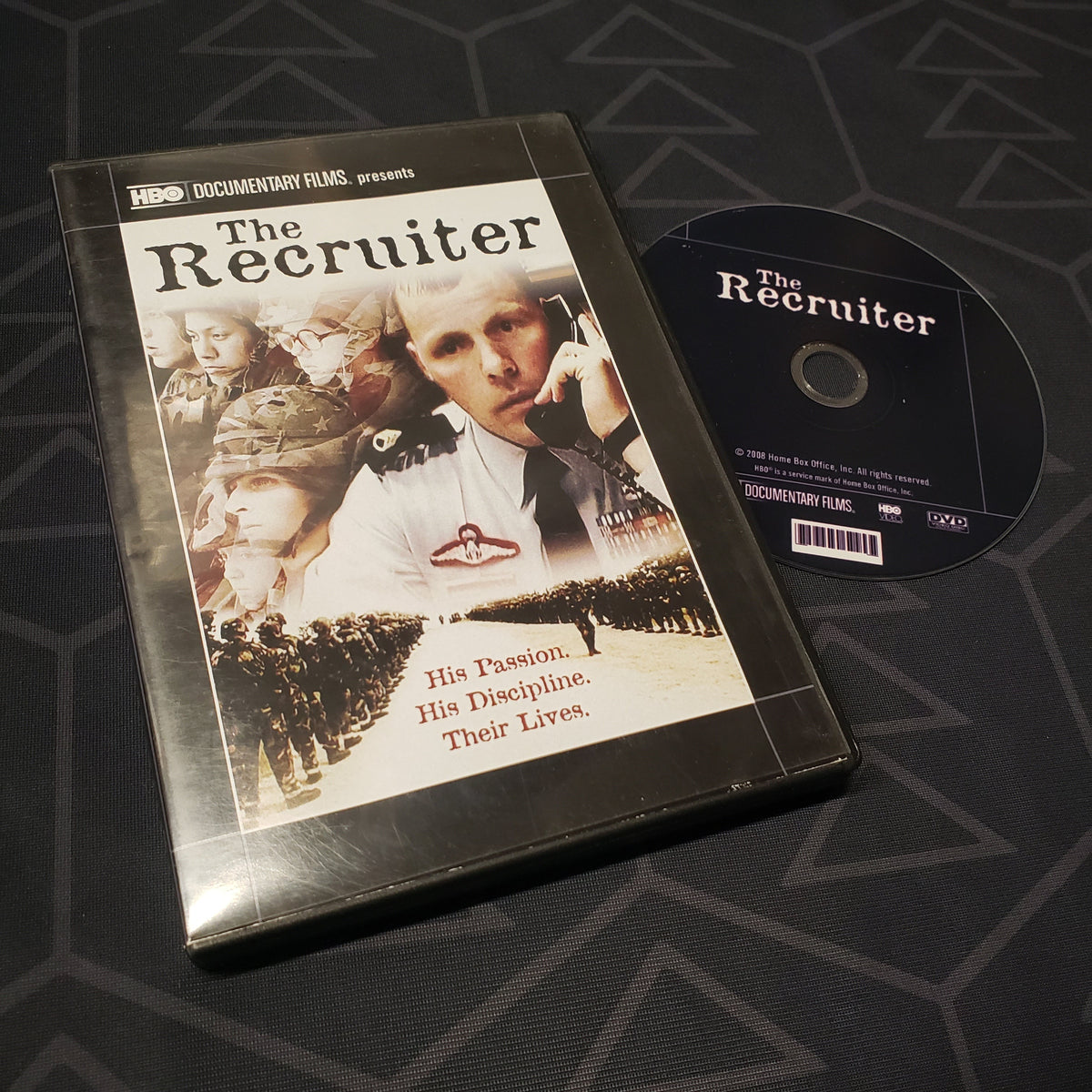 Image shows the case & disc for the documentary The Recruiter on DVD