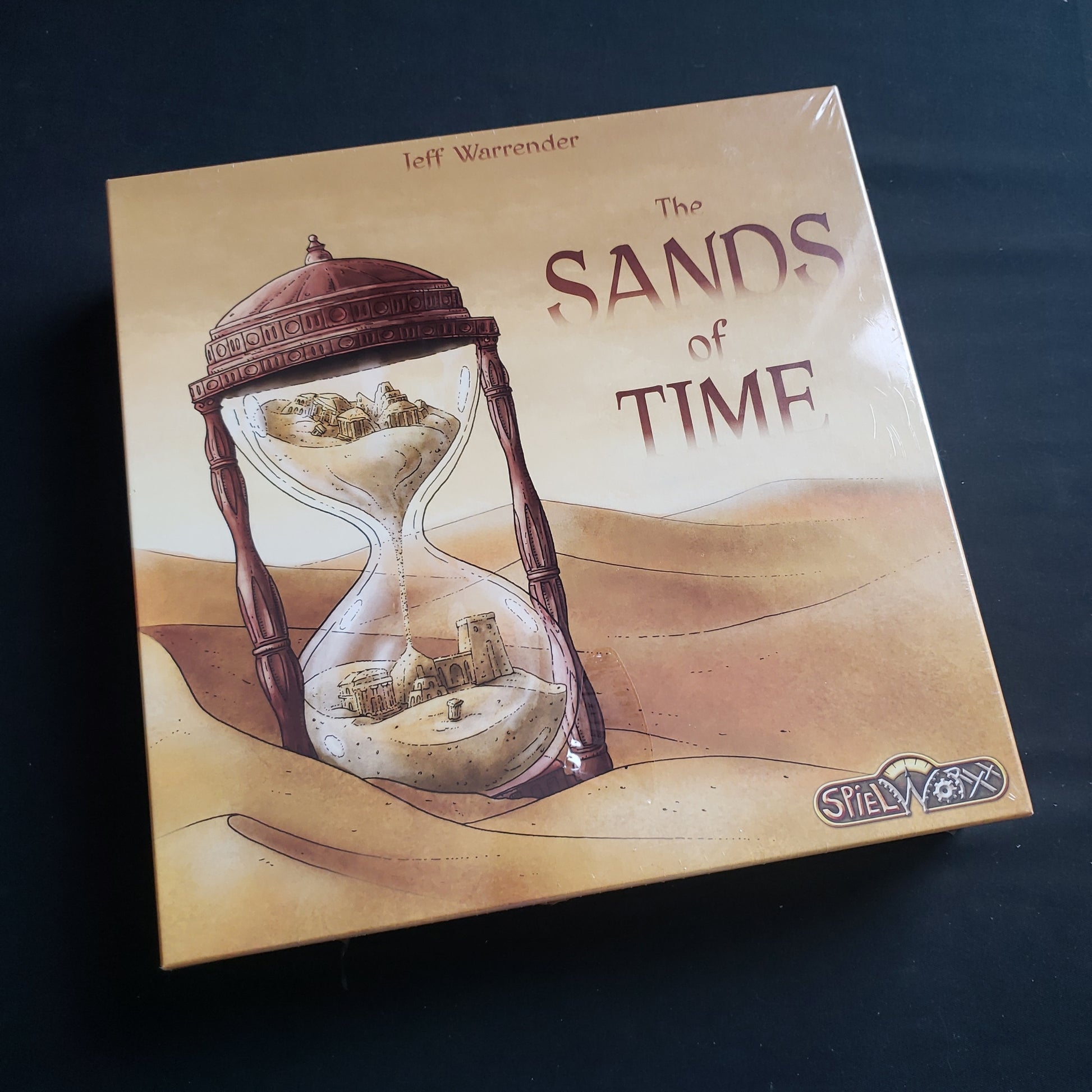Image shows the front cover of the box of the Sands of Time board game