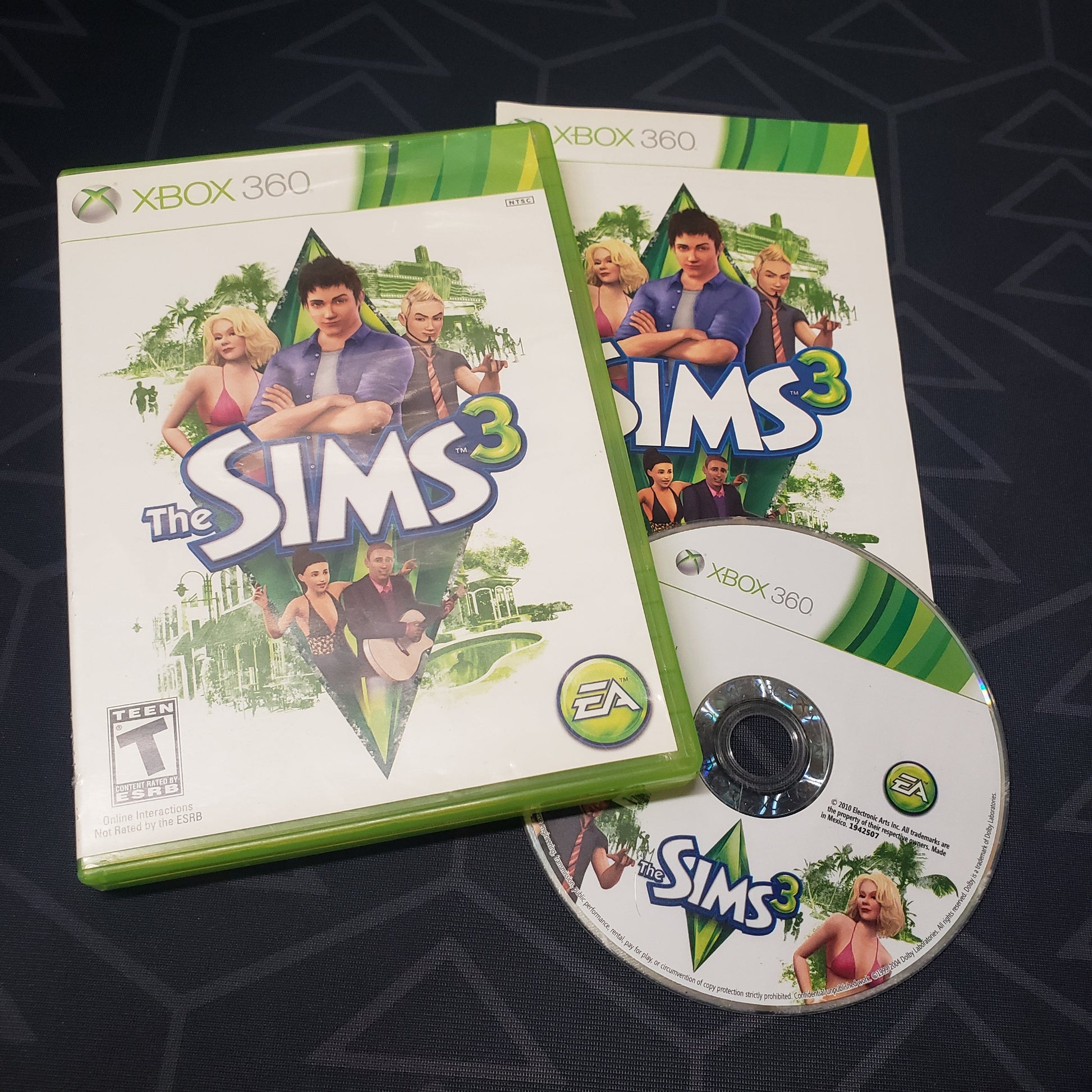 Image shows the case, manual and disc for the video game The Sims 3 for Xbox 360
