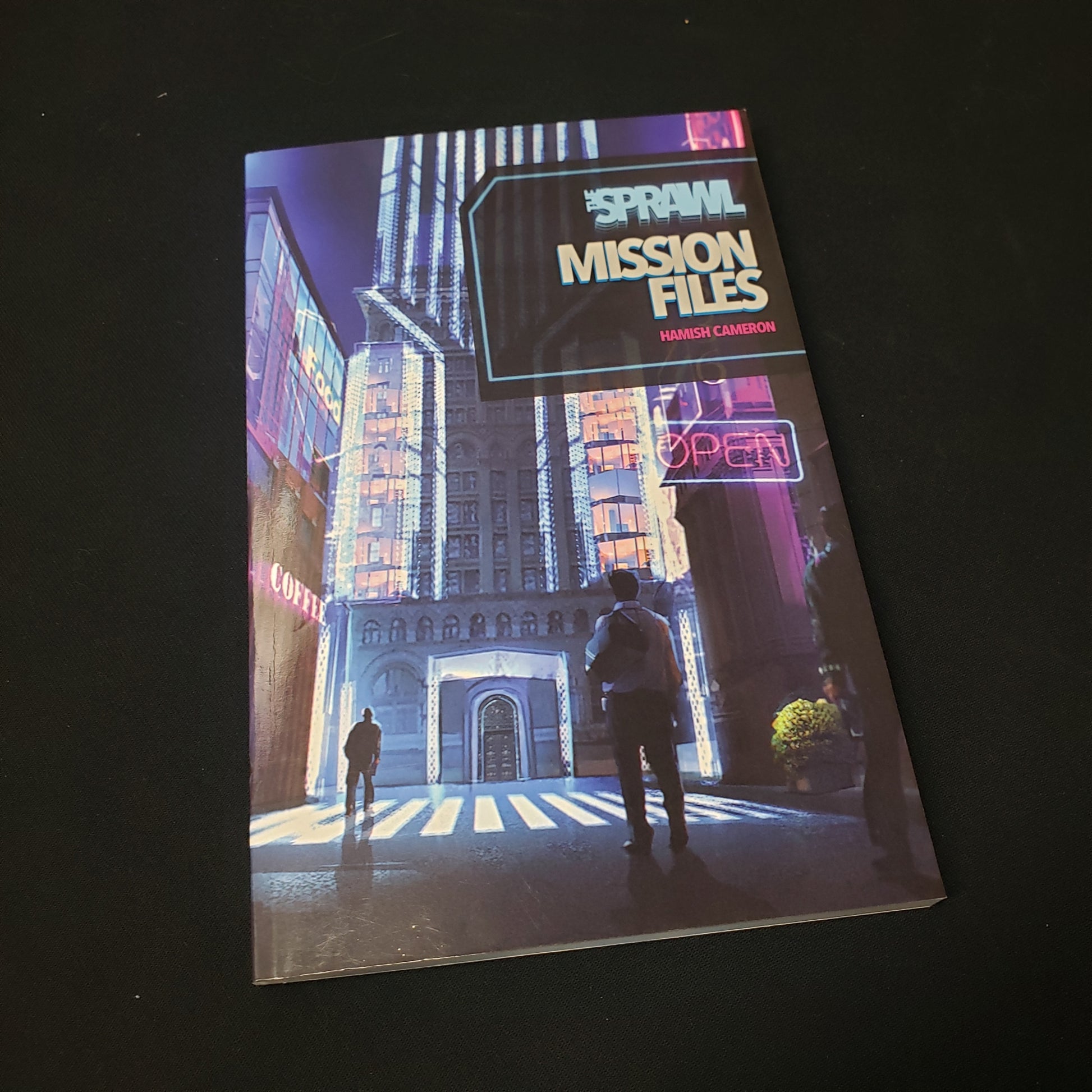 Image shows the front cover of the Mission Files book for the The Sprawl roleplaying game