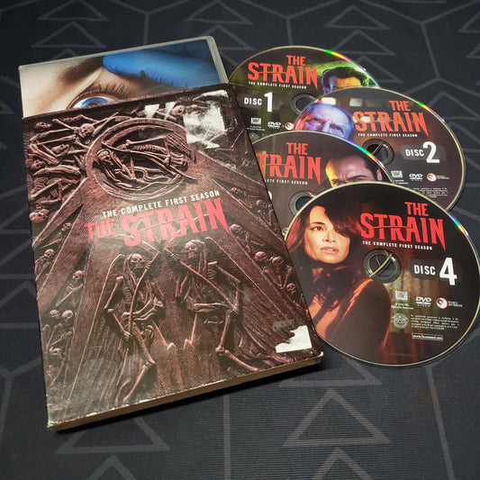 Image shows the case, outer sleeve & four discs for the first season of The Strain on DVD