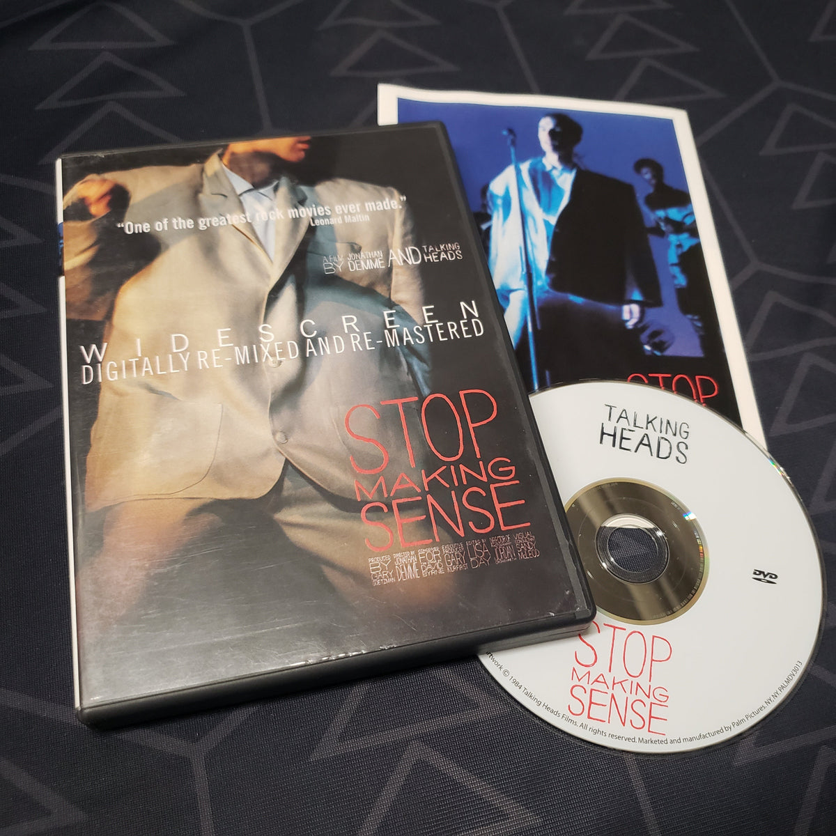 Image shows the case, insert & disc for the movie The Talking Heads: Stop Making Sense on DVD