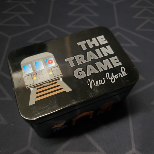 Image shows the front cover of the box of the Train Game: New York card game