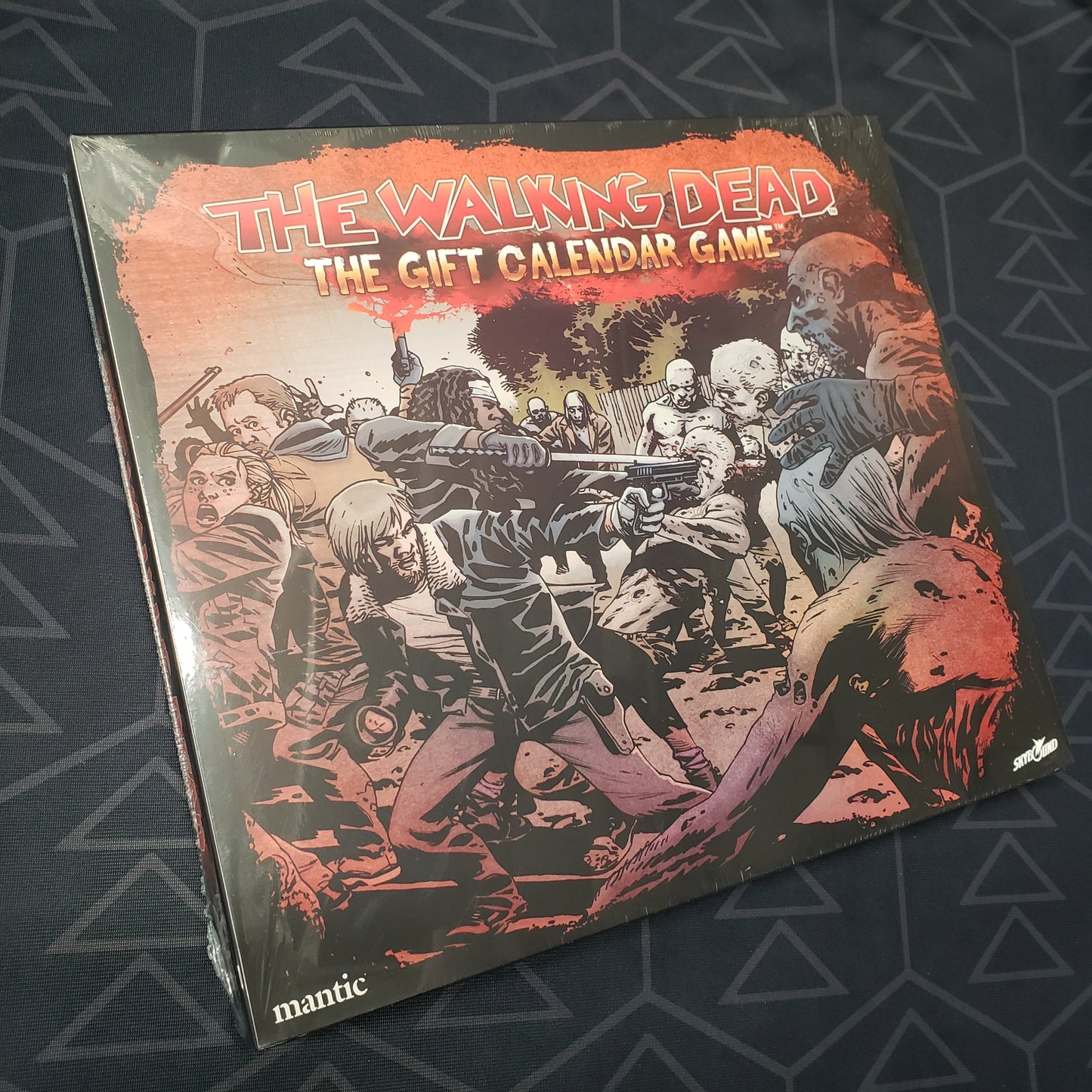 Image shows the front cover of the box for The Walking Dead: The Gift Calendar Game board game