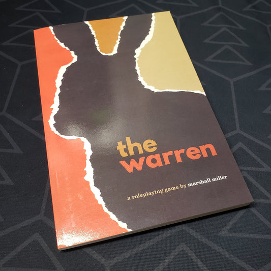 Image shows the front cover of the Warren roleplaying game book