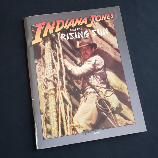 Image shows the front cover of the Indiana Jones and the Rising Sun book for the World of Indiana Jones roleplaying game