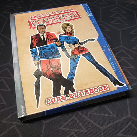 Image shows the front cover of the core rulebook for the roleplaying game They Came from [CLASSIFIED!]