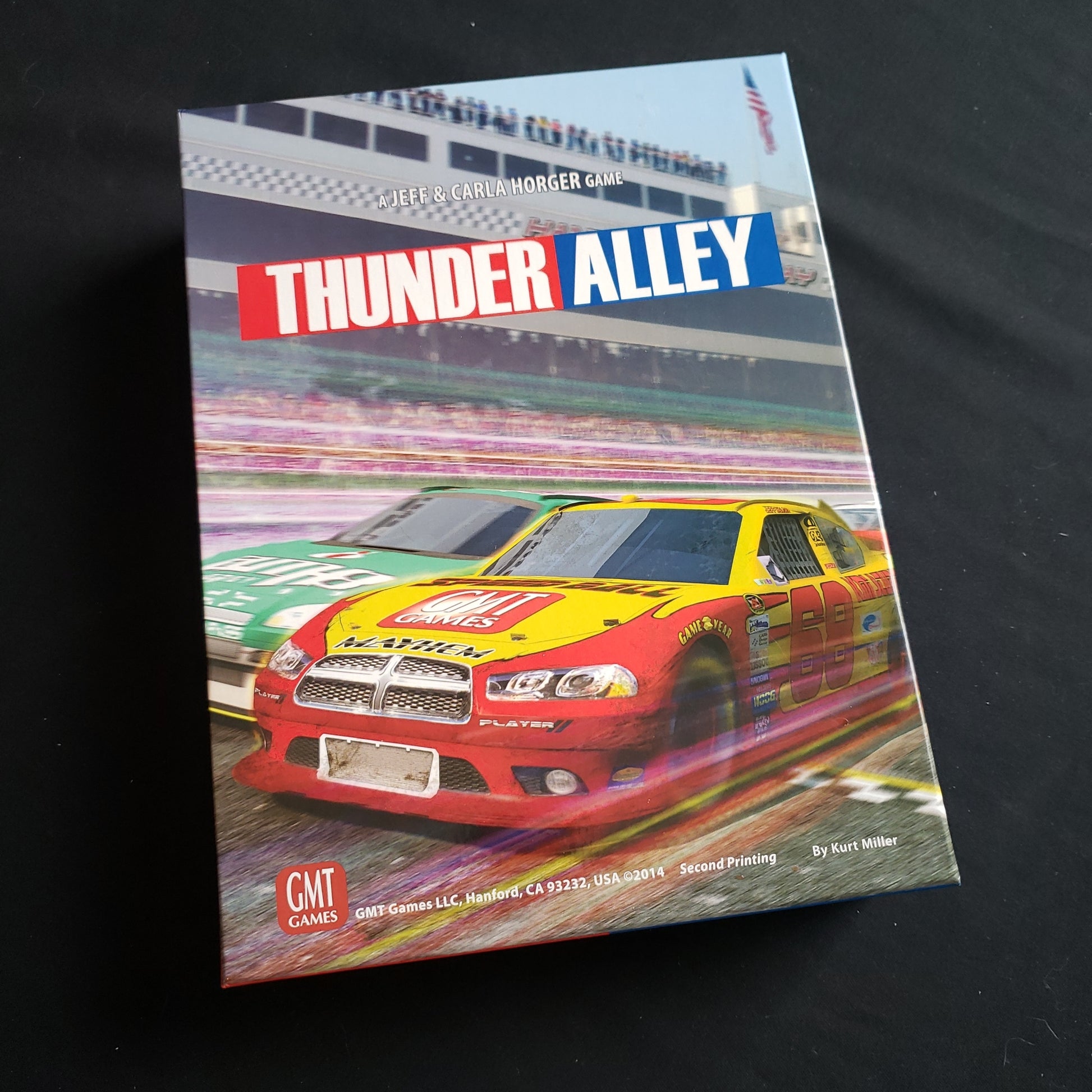 Image shows the front cover of the box of the Thunder Alley board game