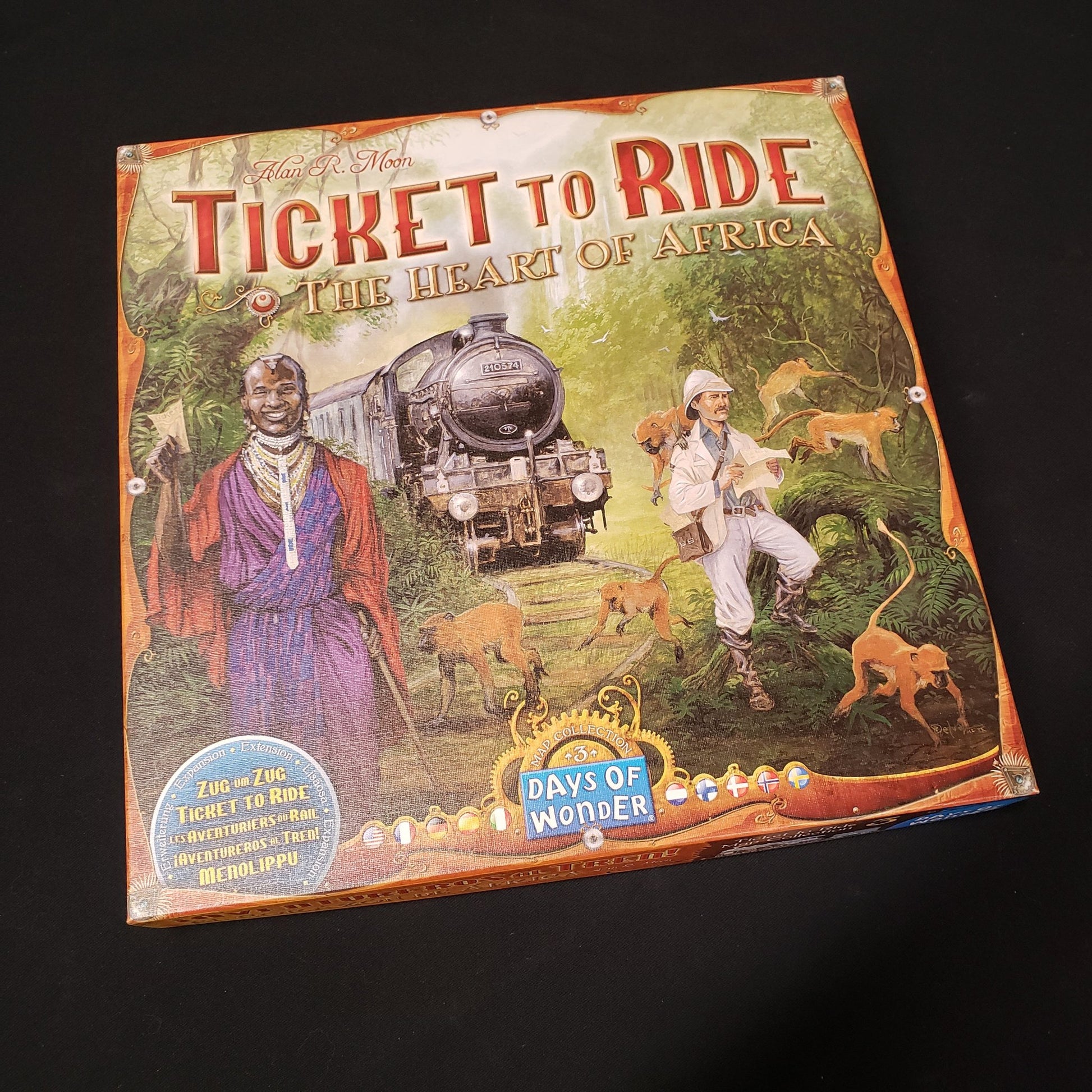 Image shows the front cover of the box of the Heart of Africa map collection for the board game Ticket to Ride