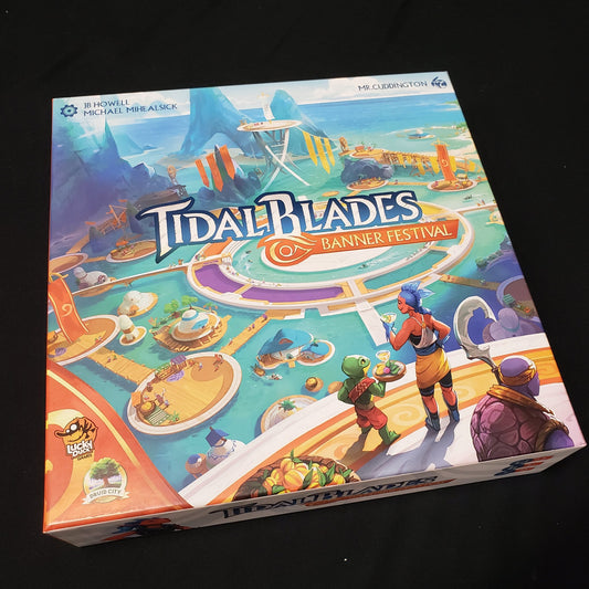 Image shows the front cover of the box of the Tidal Blades: Banner Festival board game
