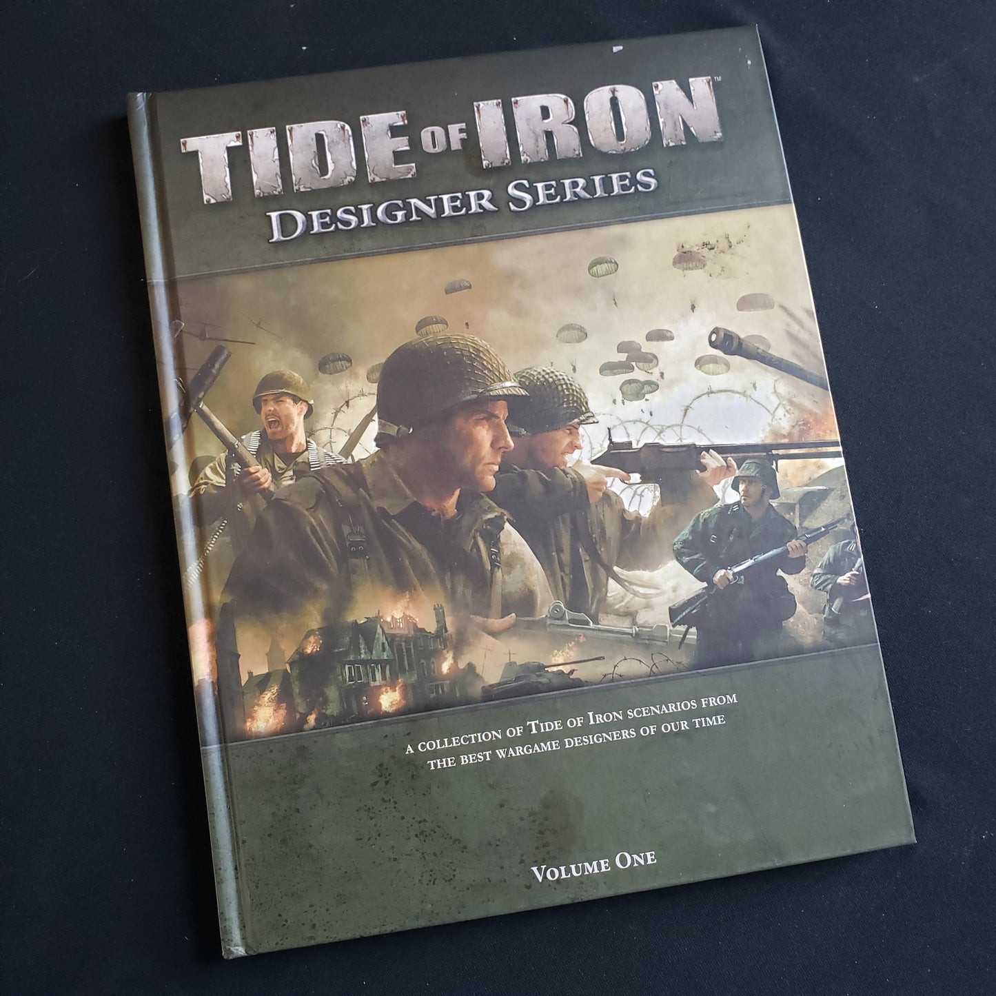 Image shows the front cover of the Designer Series Volume 1 book for the board game Tide of Iron