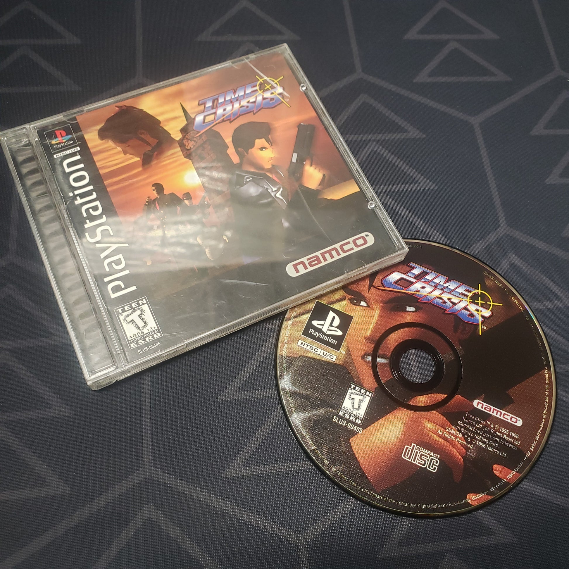 Image shows the jewel case with manual and disc for the video game Time Crisis for Playstation 1