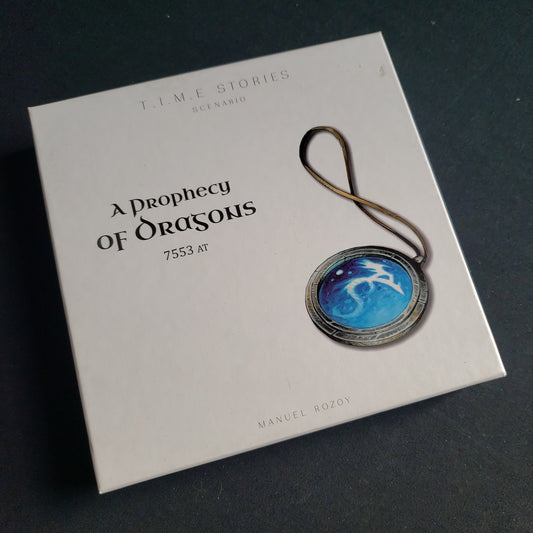 Image shows the front cover of the box of the Prophecy of Dragons expansion for the TIME Stories board game