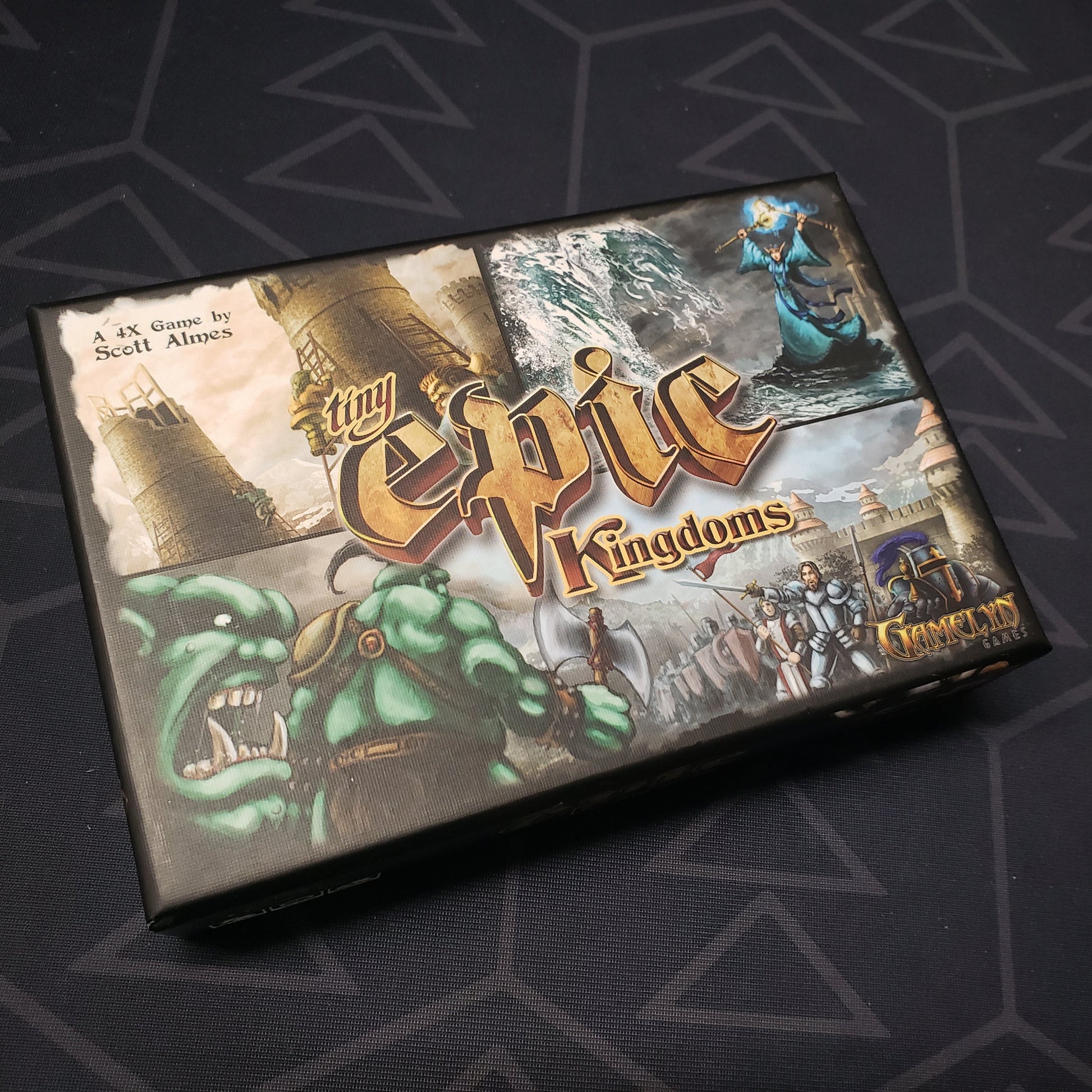 Image shows the front cover of the box for the Tiny Epic Kingdoms board game