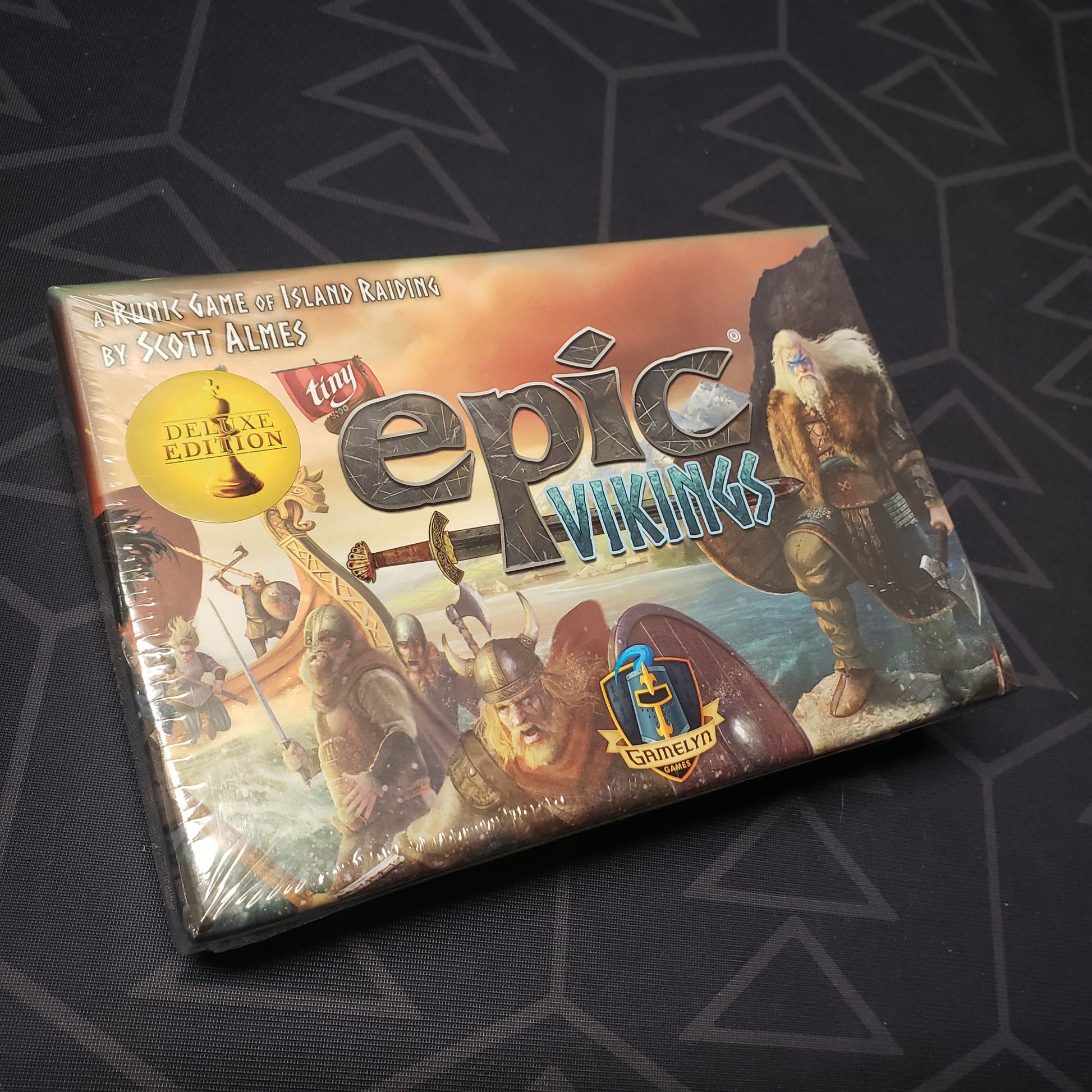 Image shows the front cover of the box for the Tiny Epic Vikings (Deluxe Edition) board game