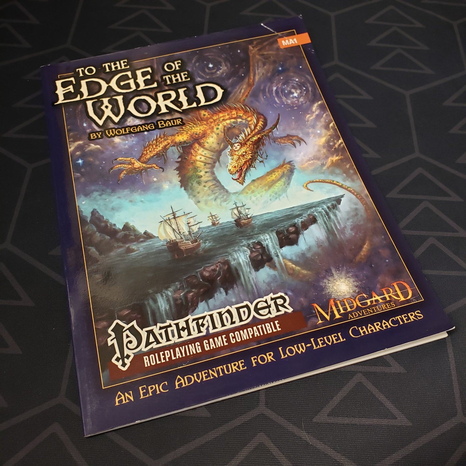 Image shows the front cover of the To the Edge of the World roleplaying game book