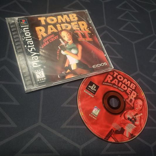 Image shows the jewel case with manual and disc for the video game Tomb Raider II for Playstation 1