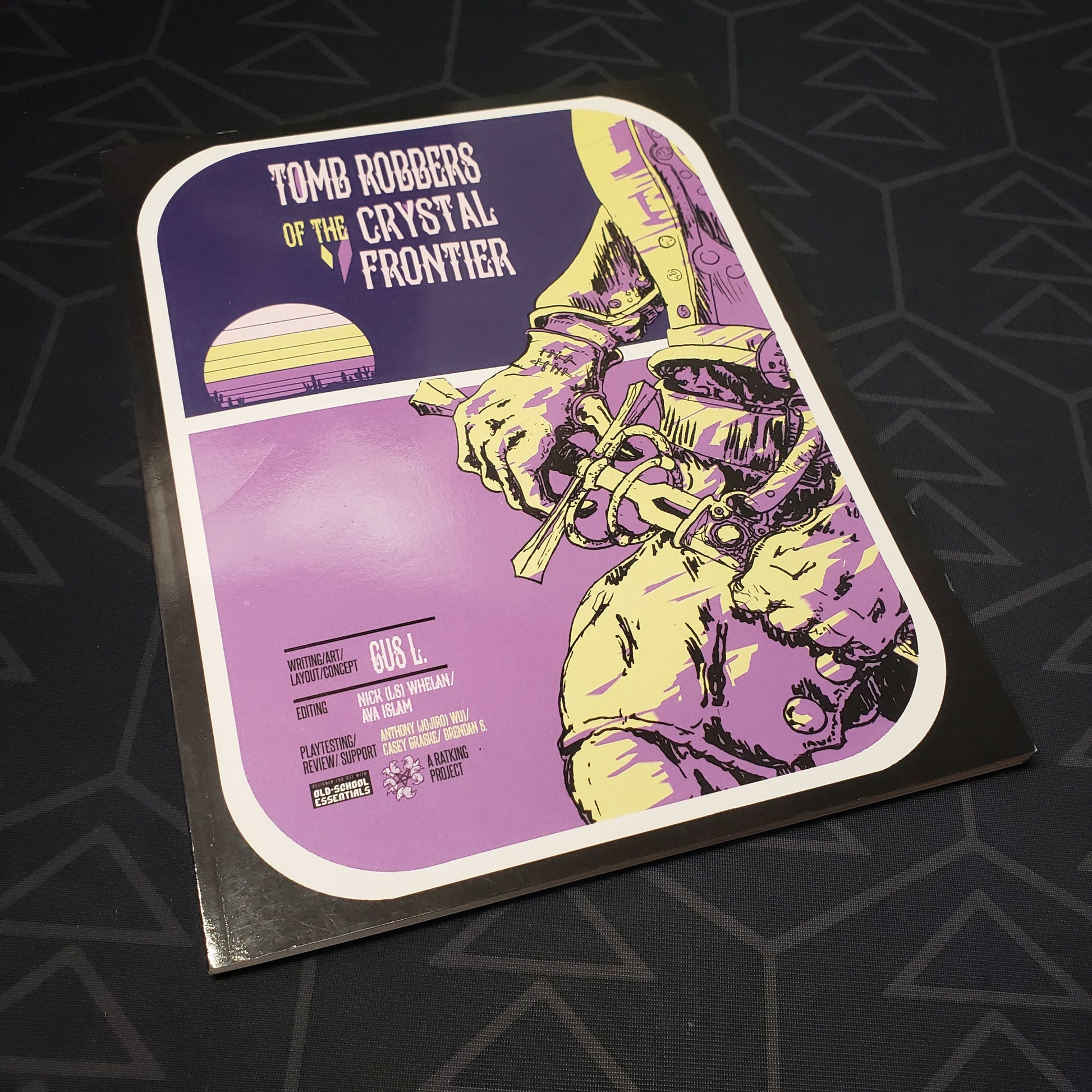 Image shows the front cover of the Tomb Robbers of the Crystal Frontier roleplaying game book