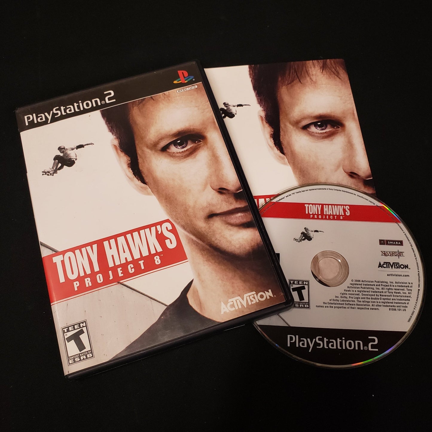 Image shows the case, manual & disc for the video game Tony hawk's Project 8 for Playstation 2