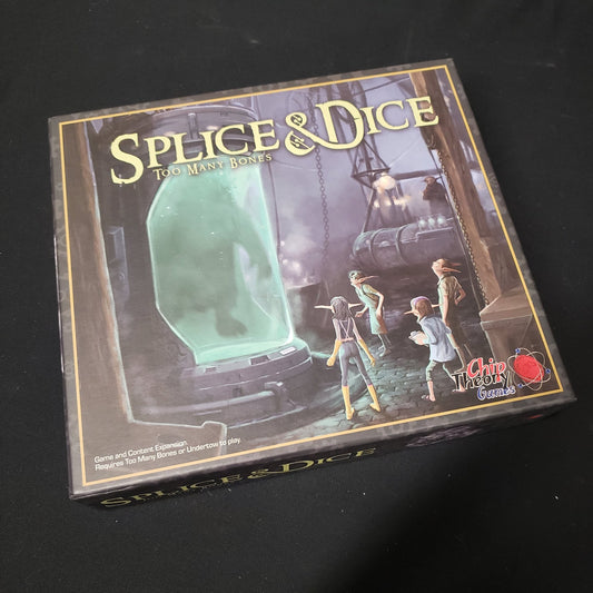 Image shows the front of the box for the Splice & Dice expansion for the board game Too Many Bones