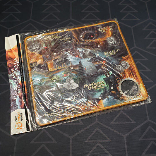 Image shows the neoprene "The Break" Adventure Map for the board game Too Many Bones in plastic packaging