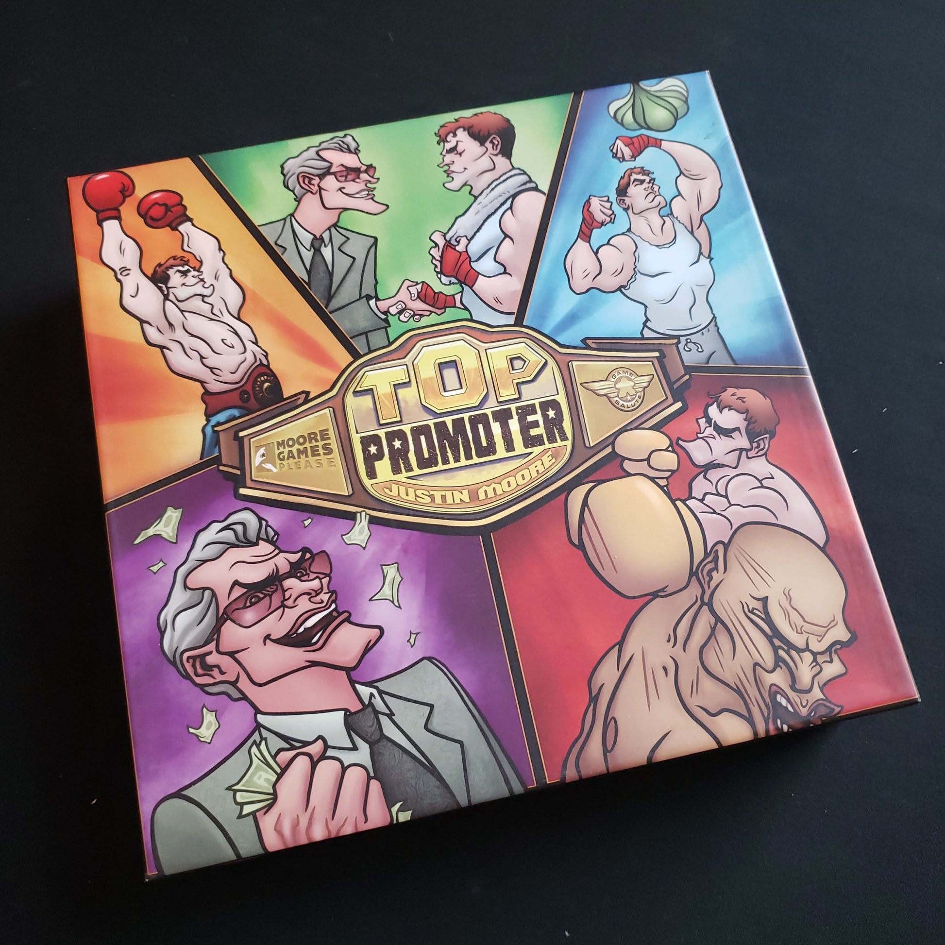 Image shows the front cover of the box of the Top Promoter card game