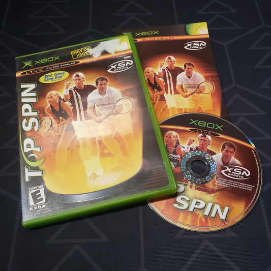 Image shows the case, manual and disc for the video game Top Spin for the original Xbox