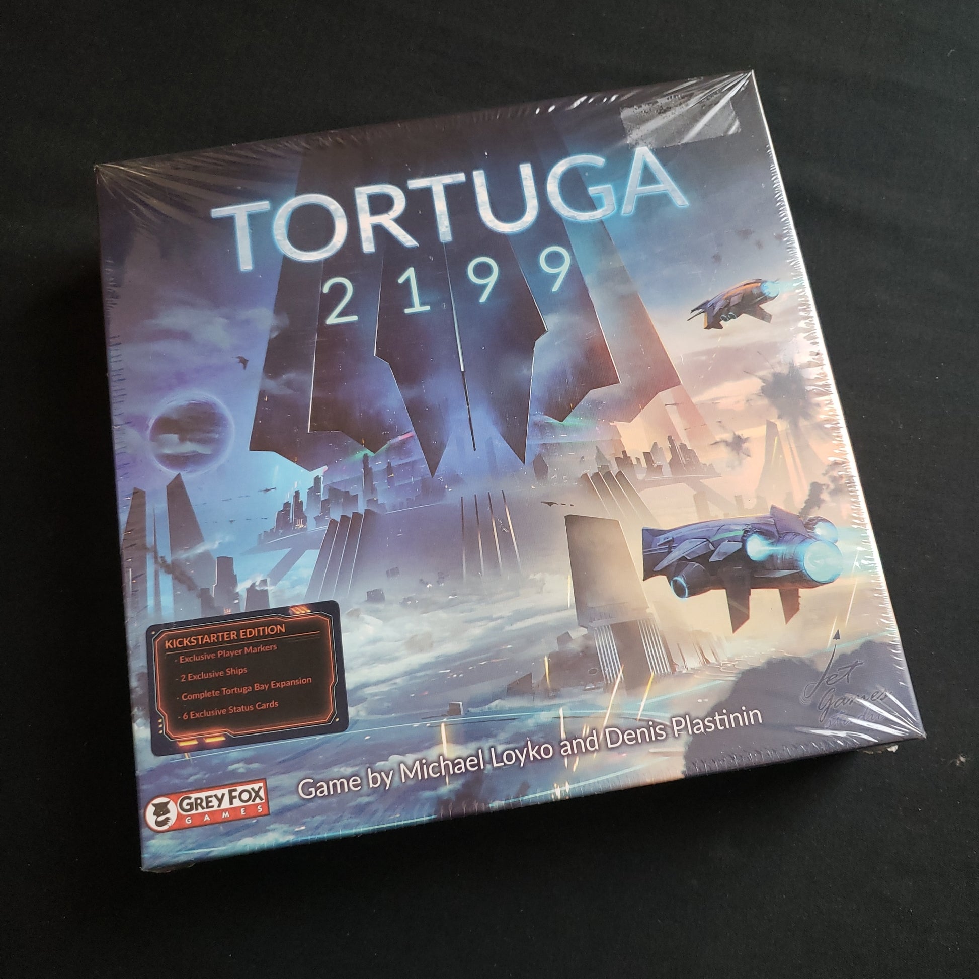 Image shows the front cover of the box of the Tortuga 2199 board game