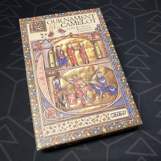 Image shows the front cover of the box of the Tournament at Camelot card game