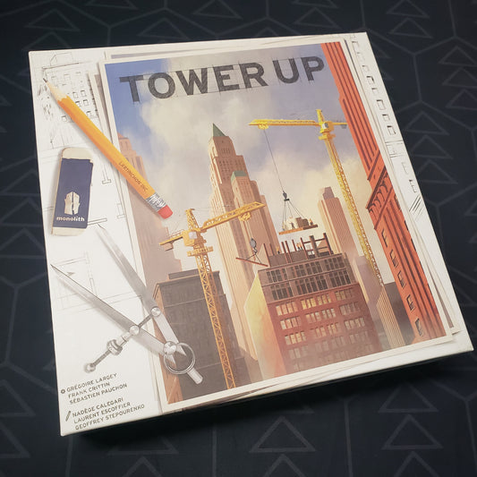 Image shows the front cover of the box for the Tower Up board game