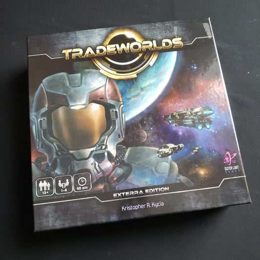 Image shows the front cover of the box of the Tradeworlds board game