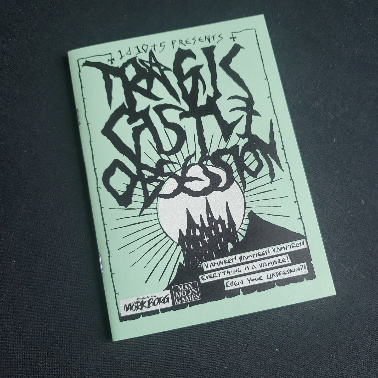 Image shows the front cover of the Tragic Castle Obsession roleplaying game zine