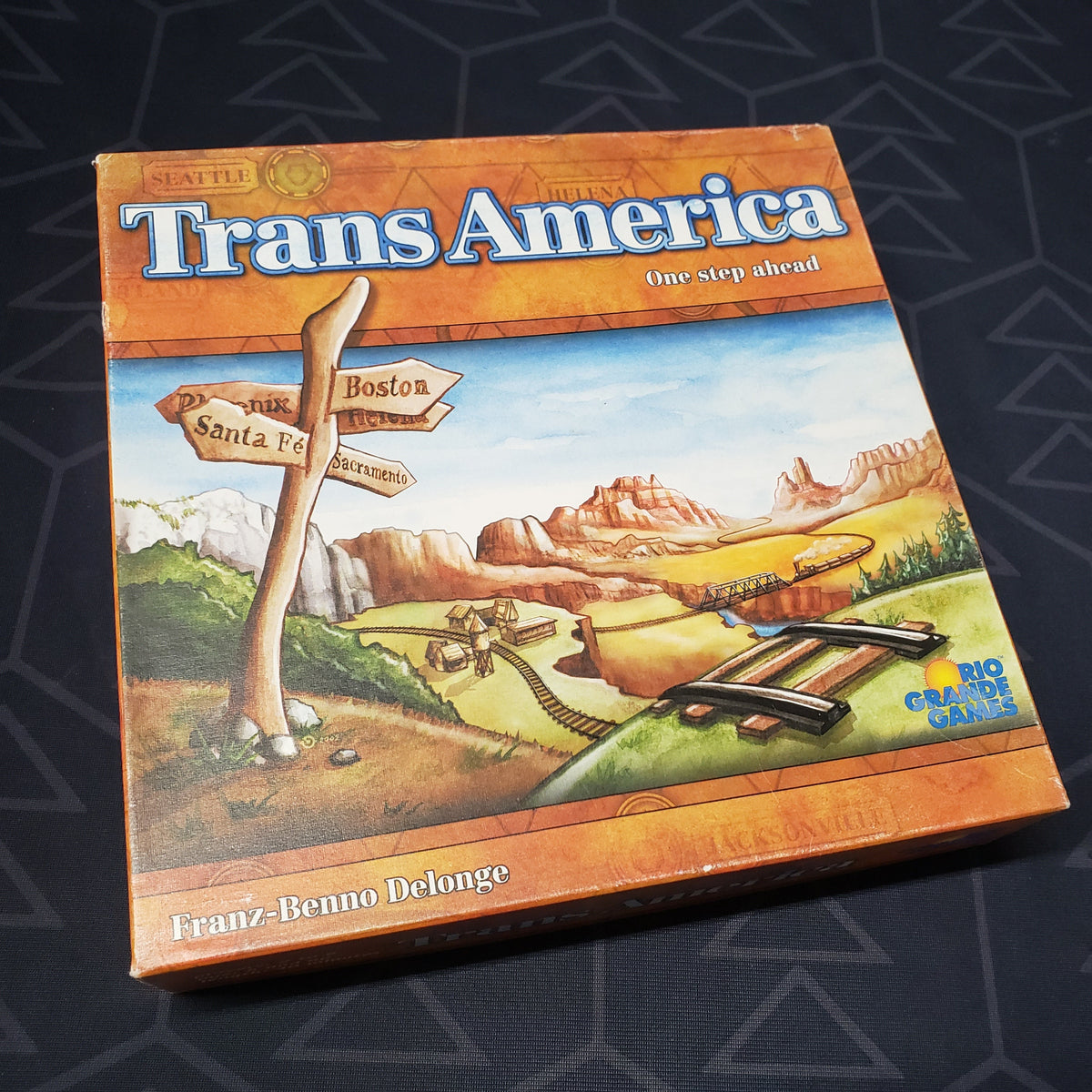 Image shows the front cover of the box for the TransAmerica board game