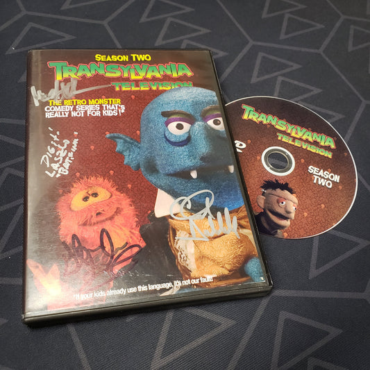 Image shows the autographed case & disc for the movie tv show Transylvania Television: Season 2 on DVD