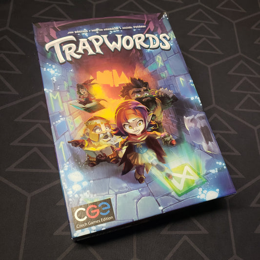Image shows the front cover of the box for the Trapwords board game