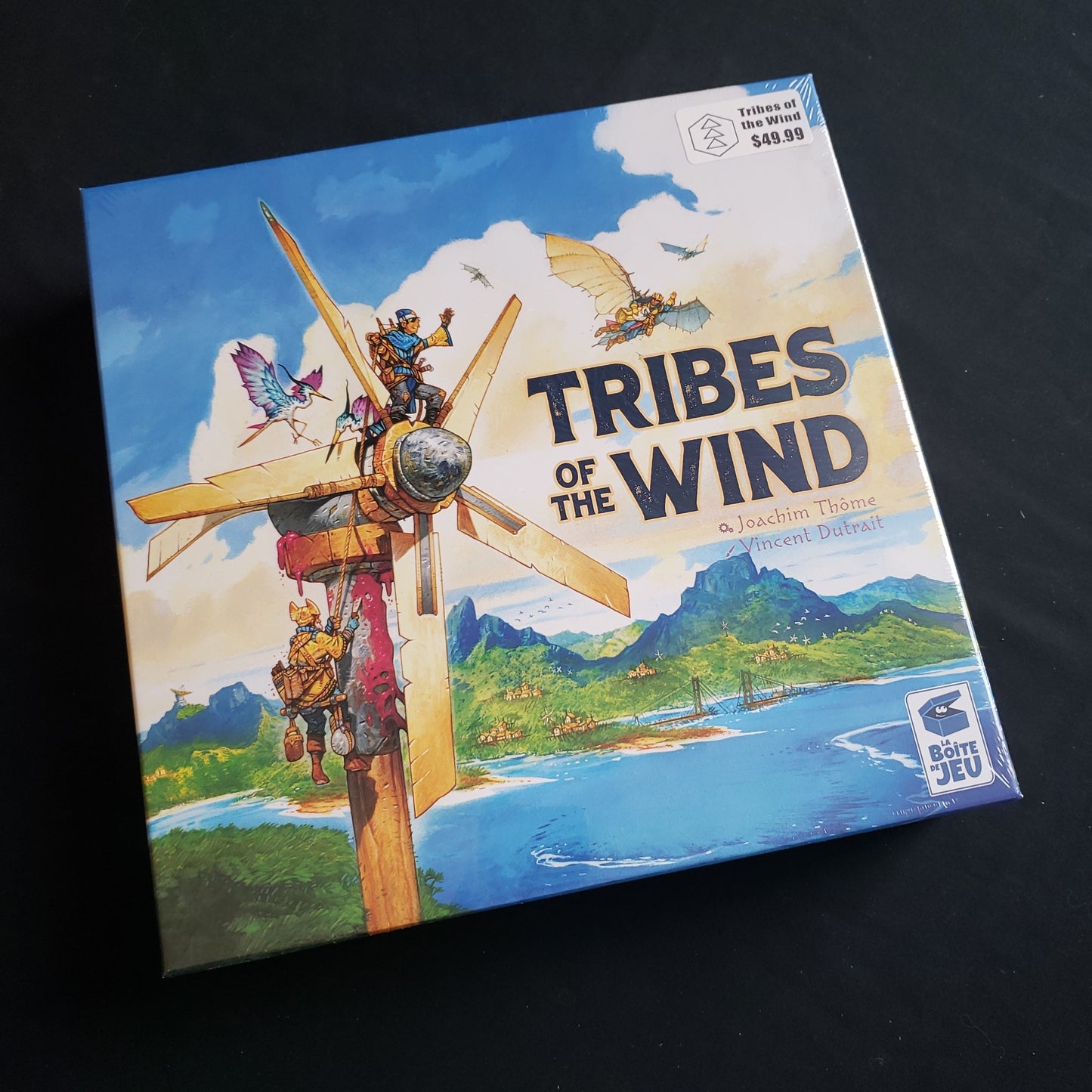 Image shows the front cover of the box of the Tribes of the Wind board game