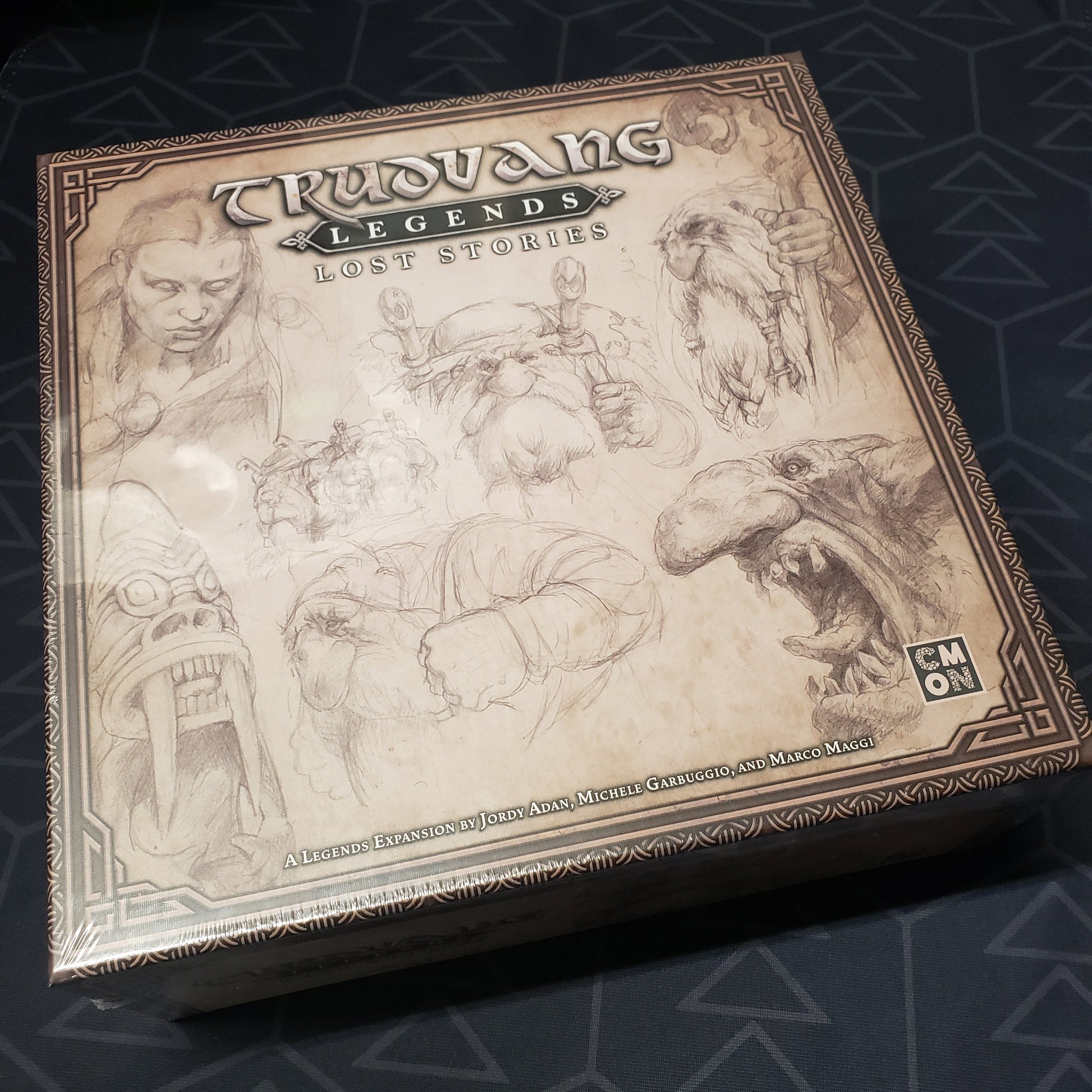 Image shows the front cover of the box of the Lost Stores expansion for the board game Trudvang Legends