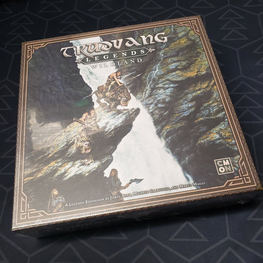 Image shows the front cover of the box of the Wildland expansion for the board game Trudvang Legends