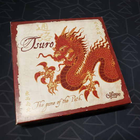 Image shows the front cover of the box for the Tsuro board game
