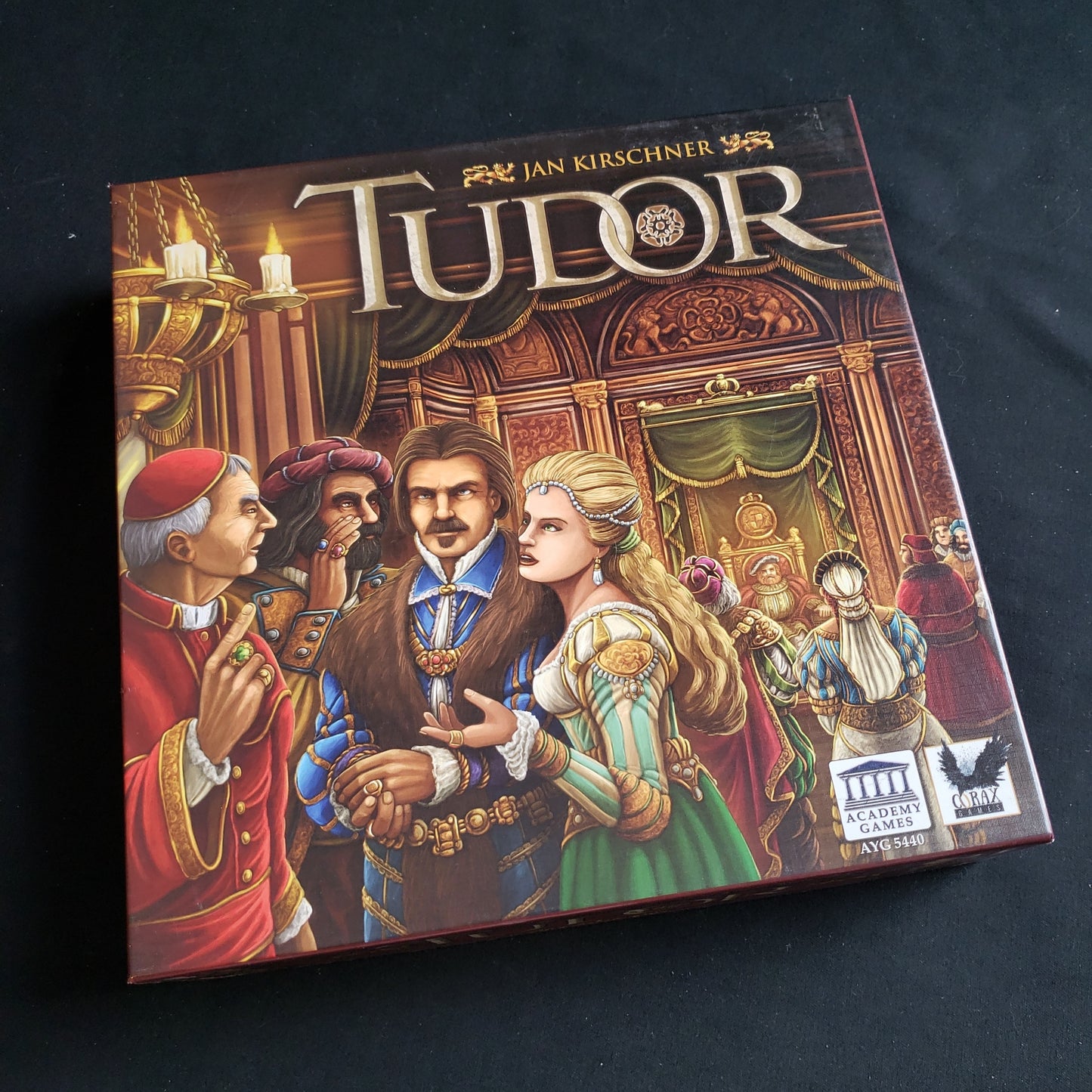 Image shows the front cover of the box of the Tudor board game